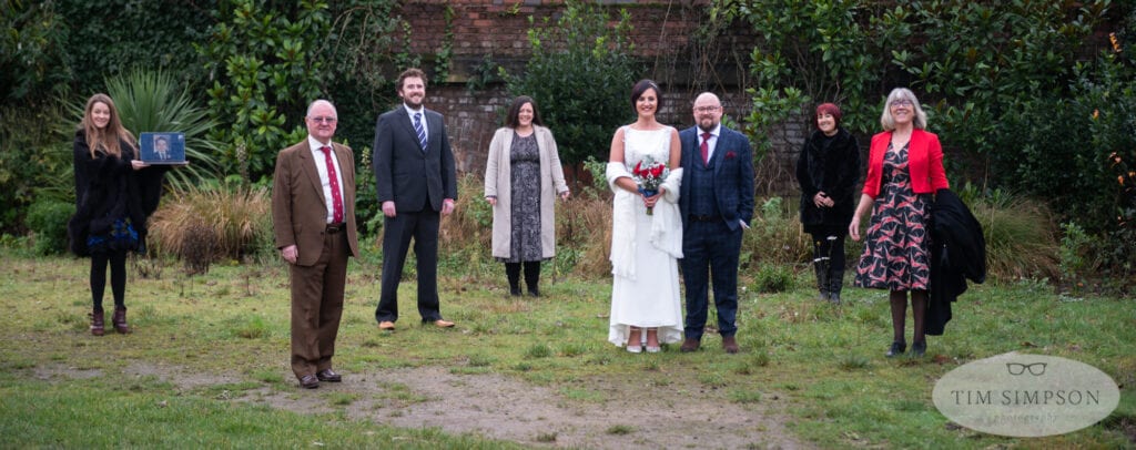 socially distanced wedding group shot