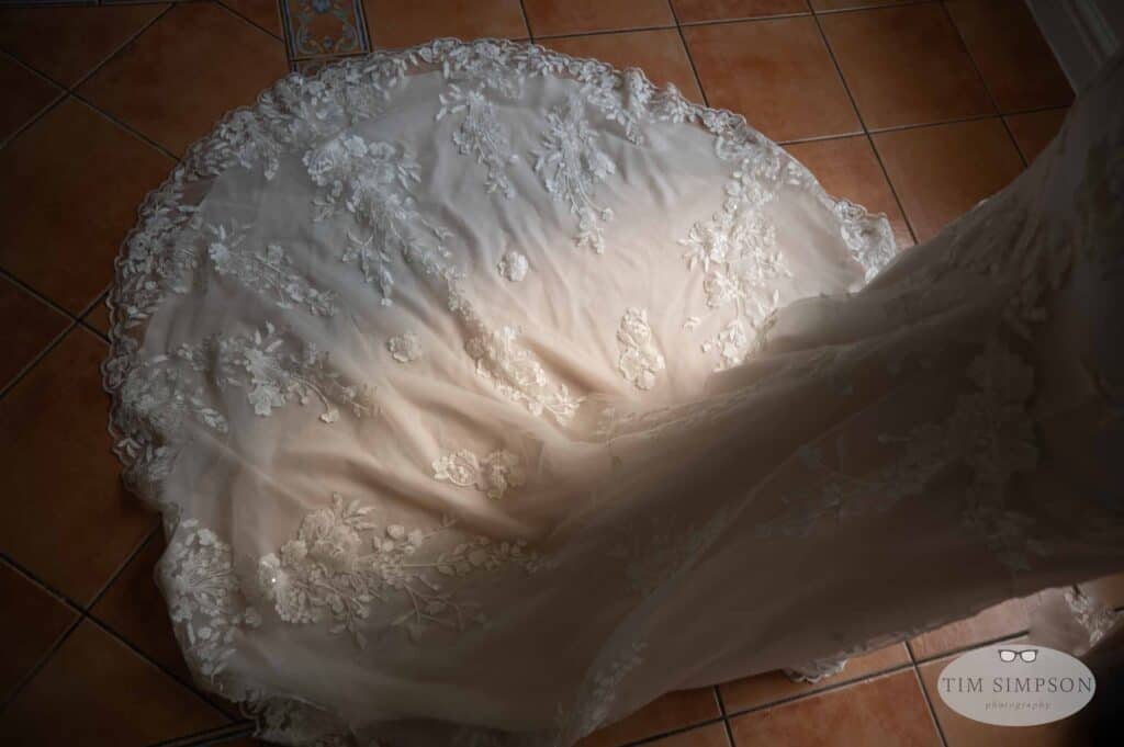 wedding dress in partial light