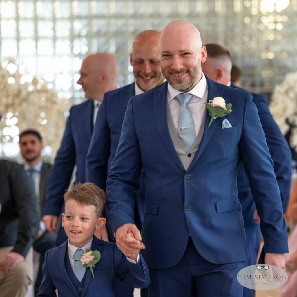 groom and son at wedding